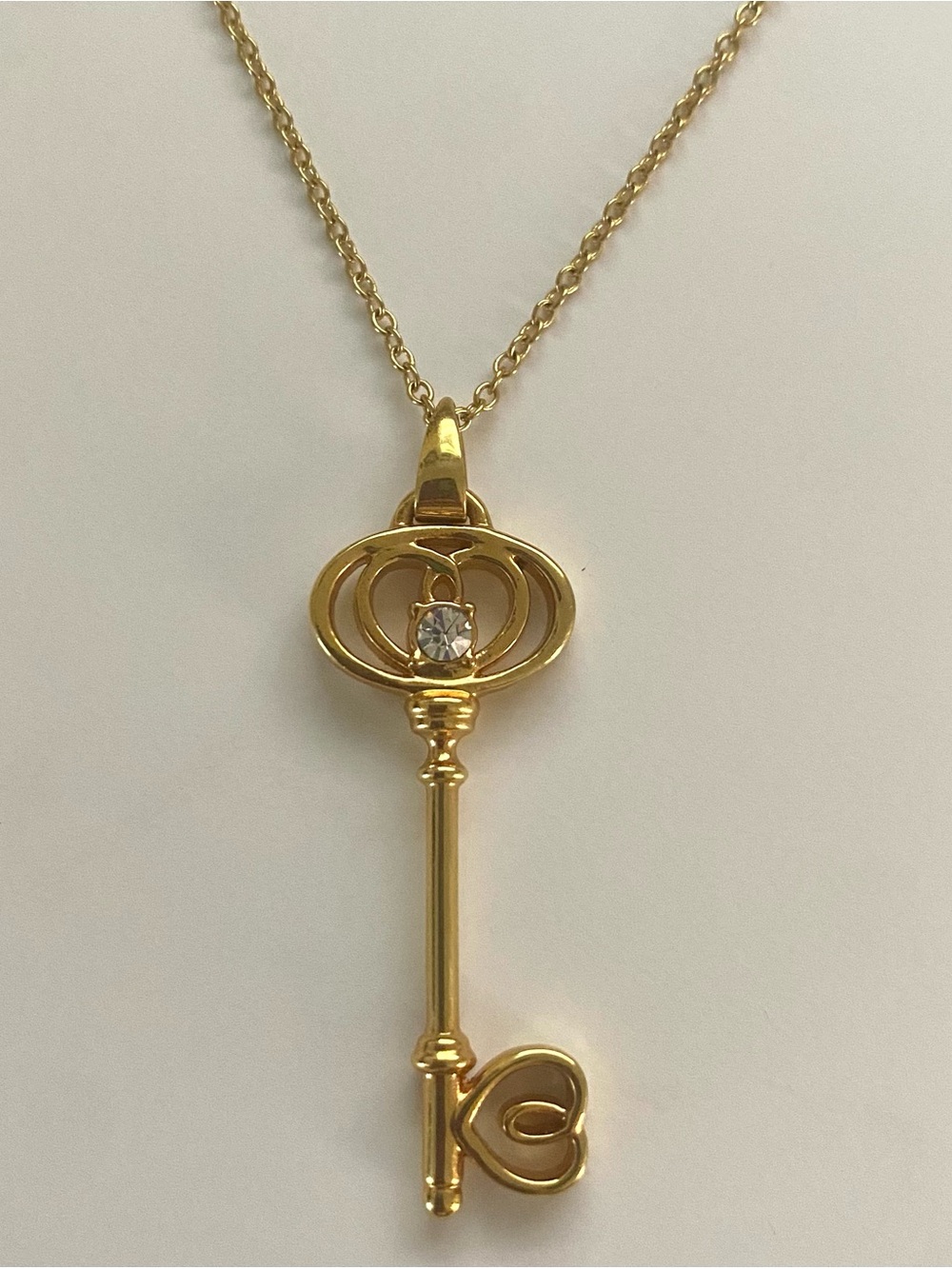 Gold key pendant necklace